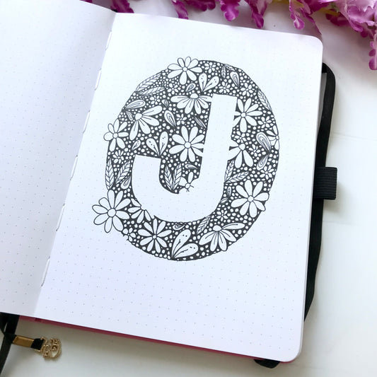 How To Create A White Space Floral Monogram + 12 FREE Bullet Journal Cover Designs