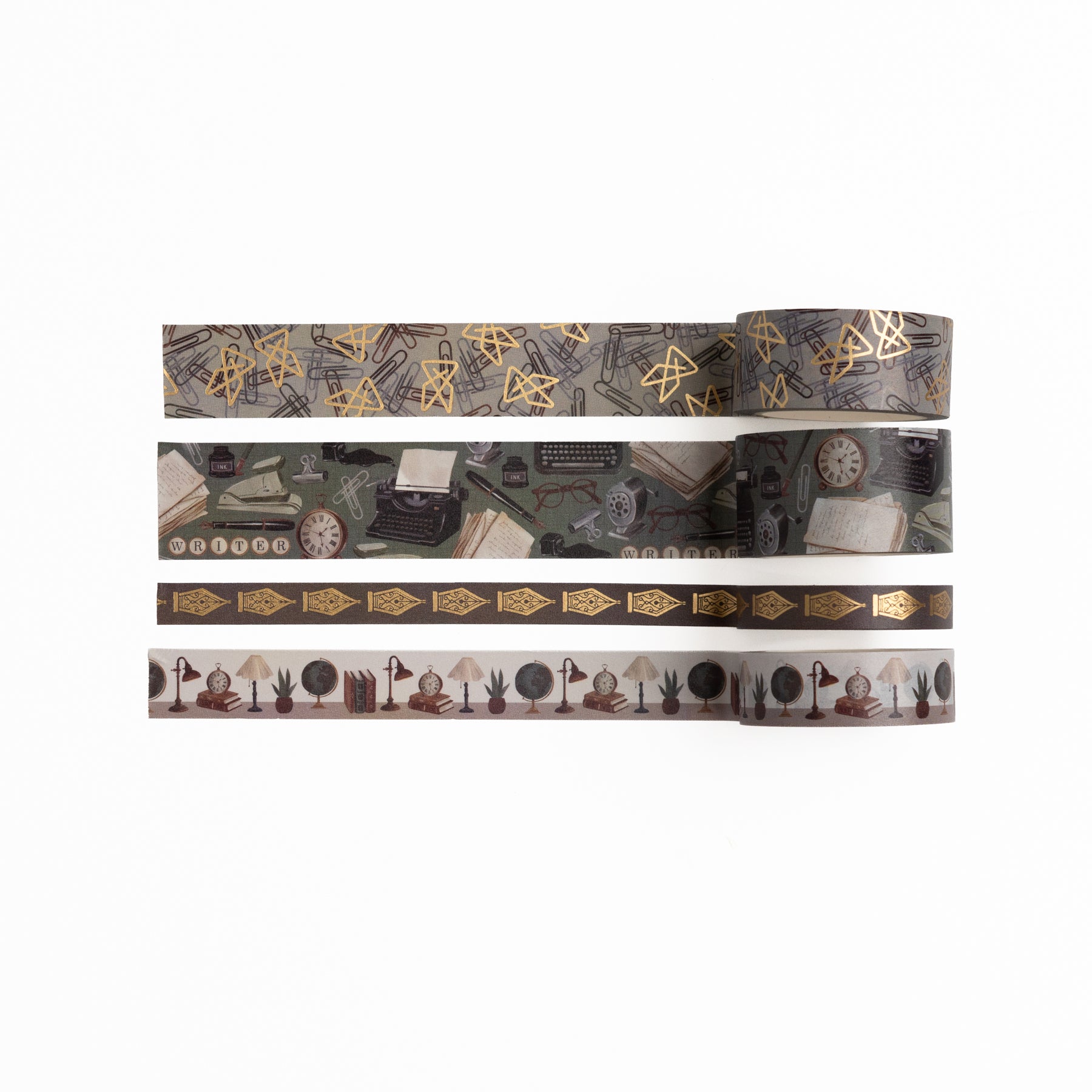 Four rolls of The Writer's Desk Washi Tape with typewriter, lamp, and gold geometric patterns