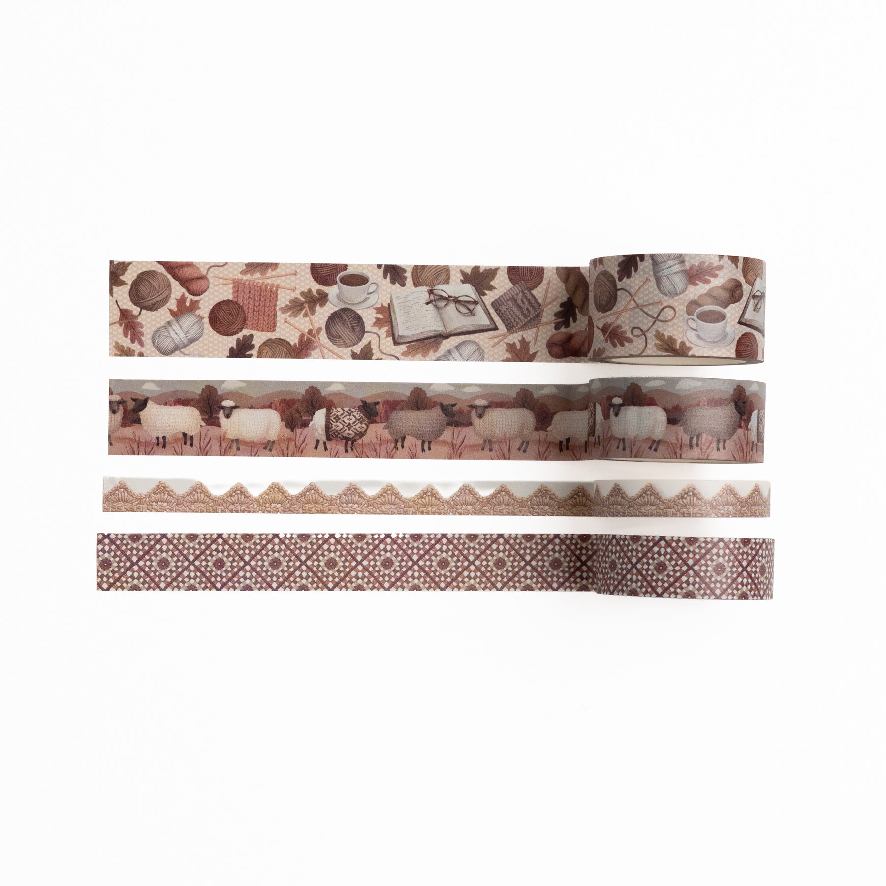 Four rolls of Homespun washi tape featuring sheep, yarn, and knitting motifs