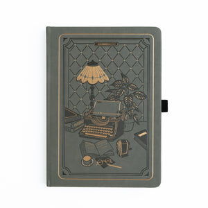 Deep olive green vegan leather notebook with gold vintage desk illustration featuring typewriter and globe