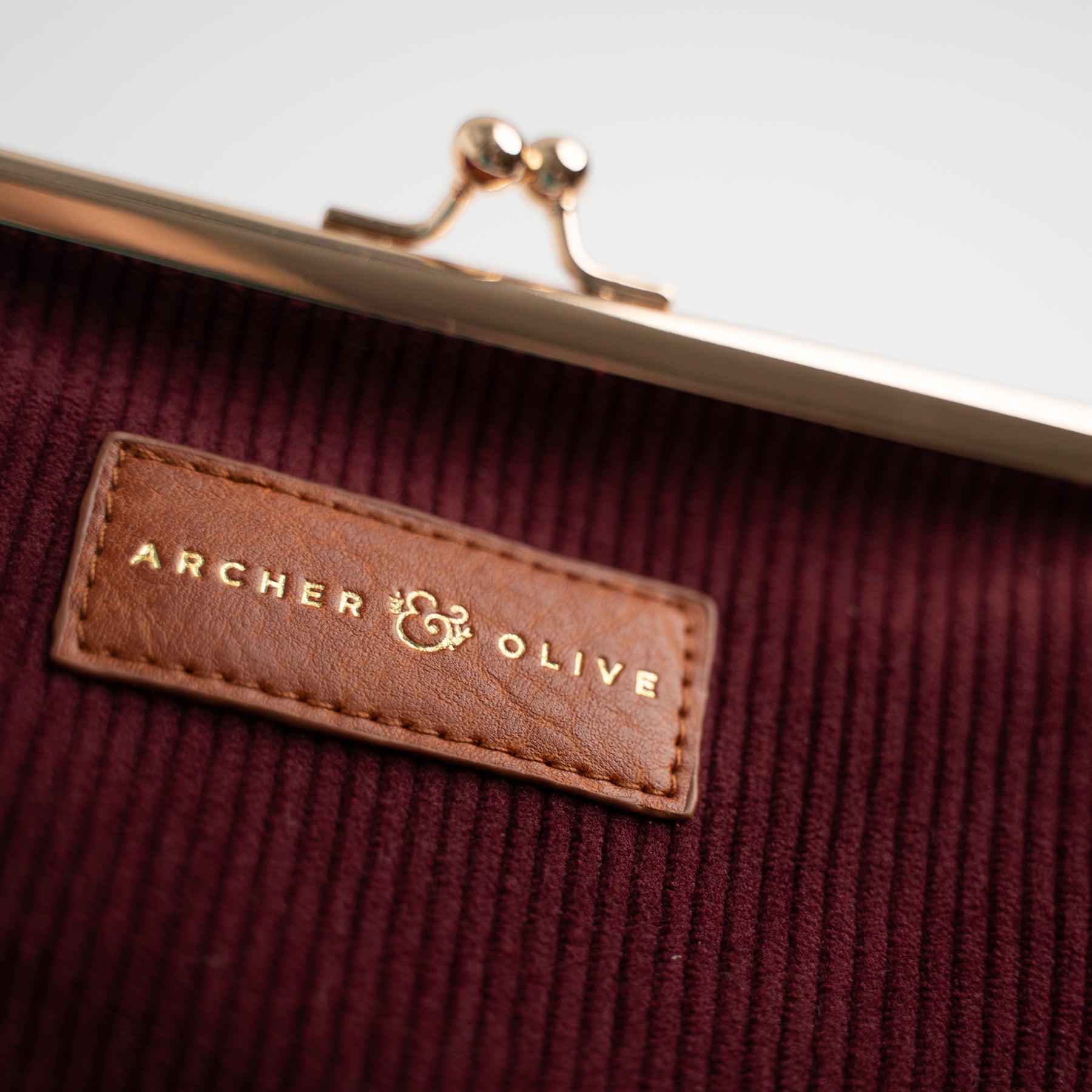 Quiet Corners Kiss Lock Pouch in Maroon