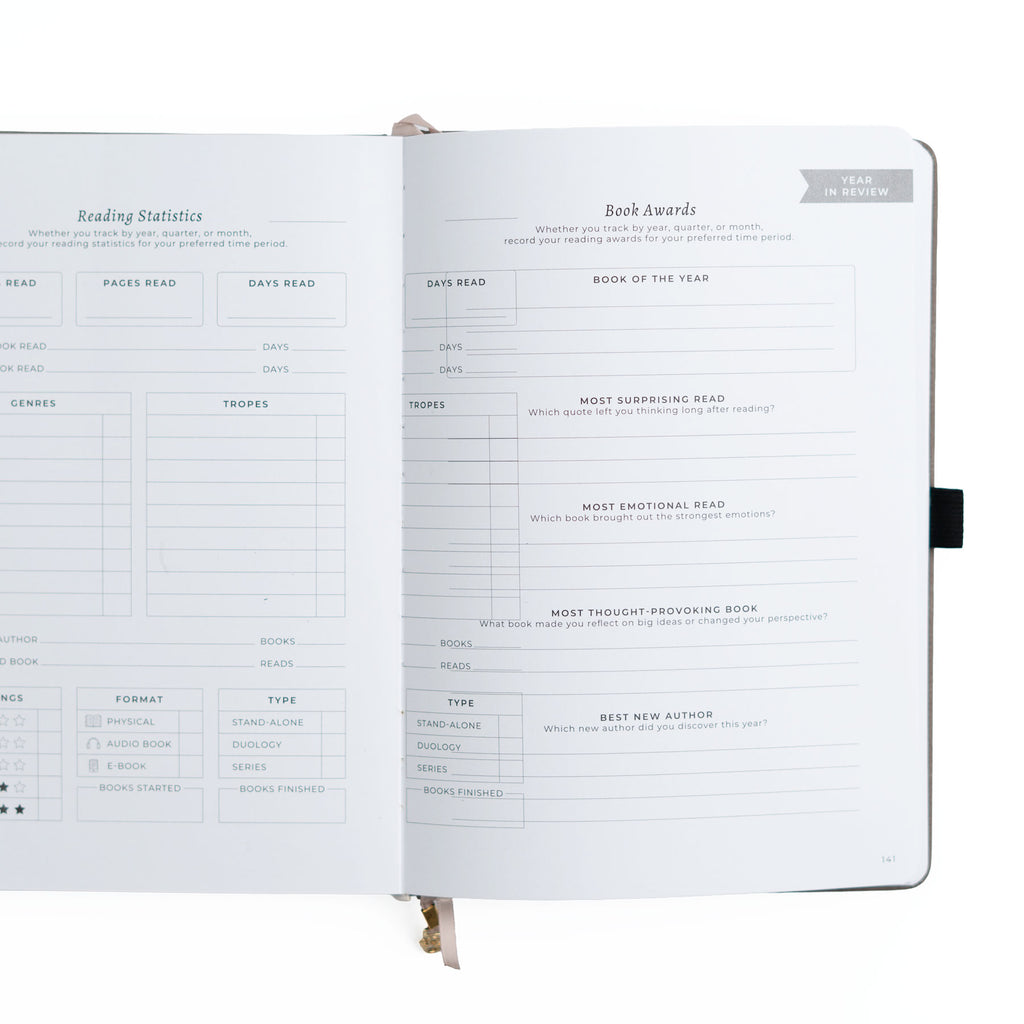 Open notebook with reading statistics and book awards sections on a white background