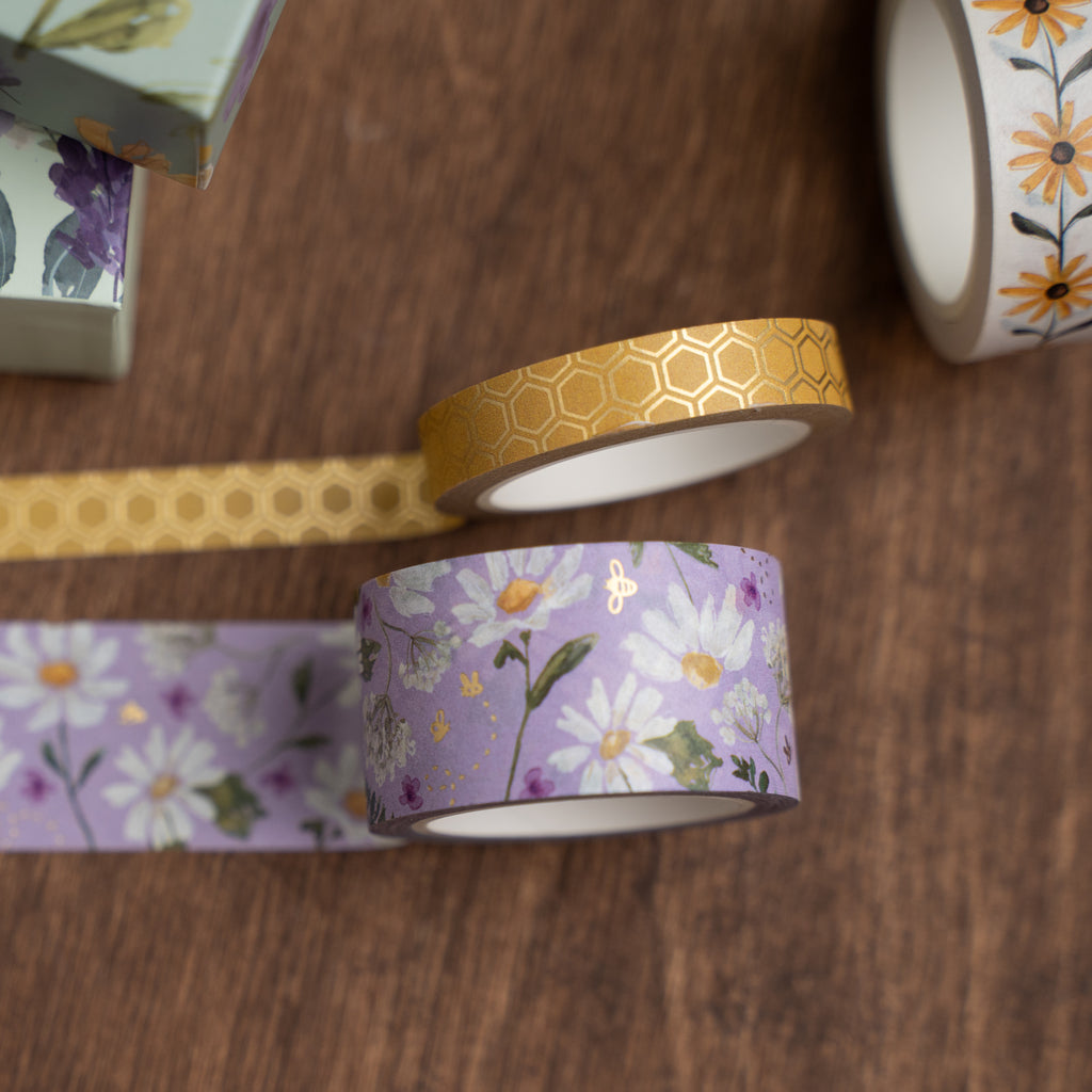 Decorative tape rolls with floral and geometric patterns 