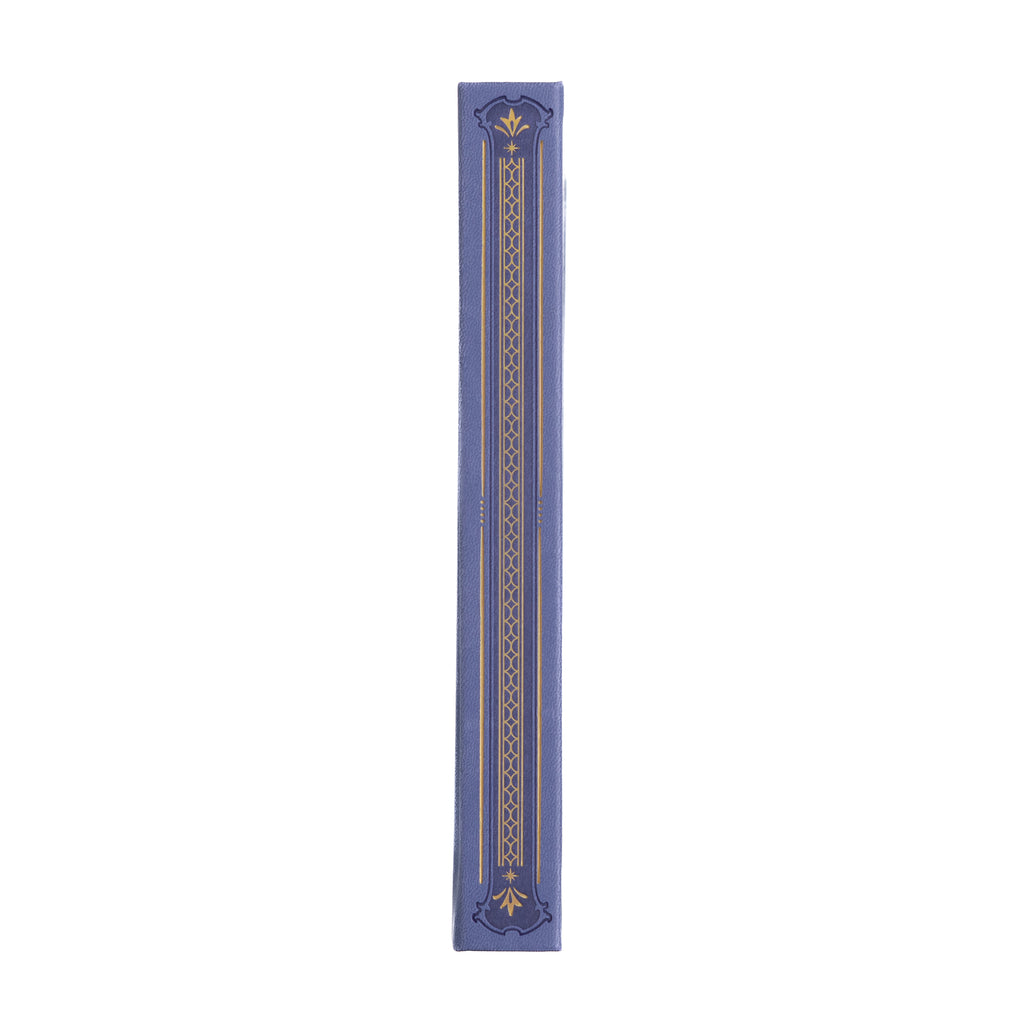 Spine of notebook with periwinkle color and gold foil details