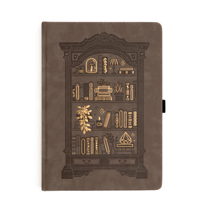Brown notebook with decorative bookshelf illustration on a white background