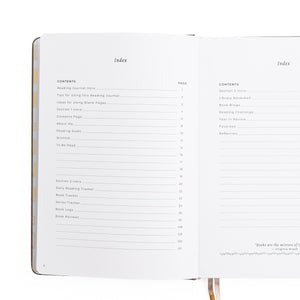 Open book showing table of contents and index on white background