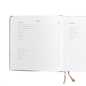 Open notebook displaying an index and table of contents on a white background