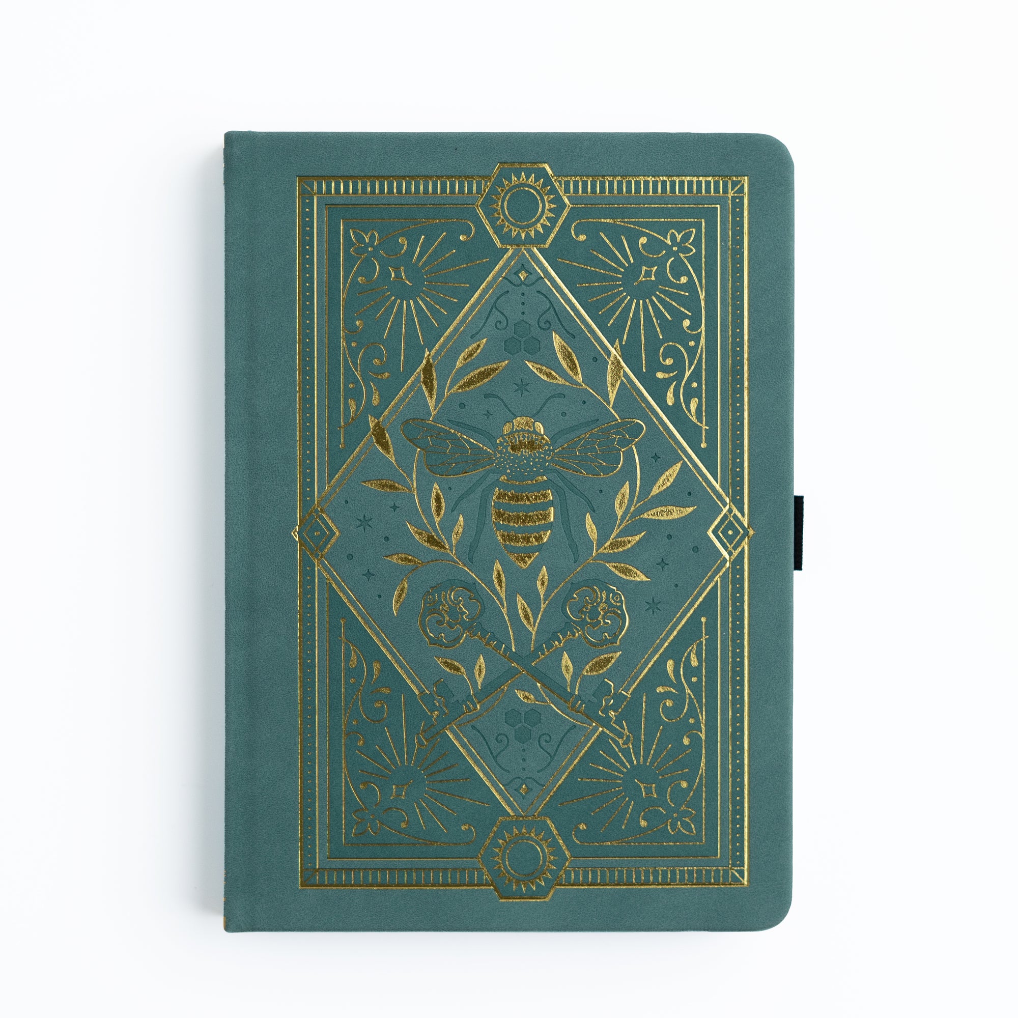 Green notebook with gold embossed design featuring a bee on a white background