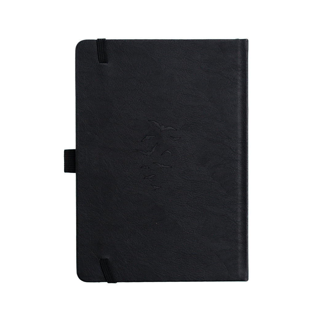 Black notebook on a white background