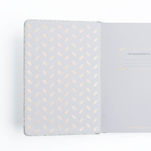 Notebook with geometric pattern on cover and back