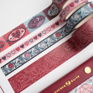 Set of decorative tapes with floral and heart designs on a white background